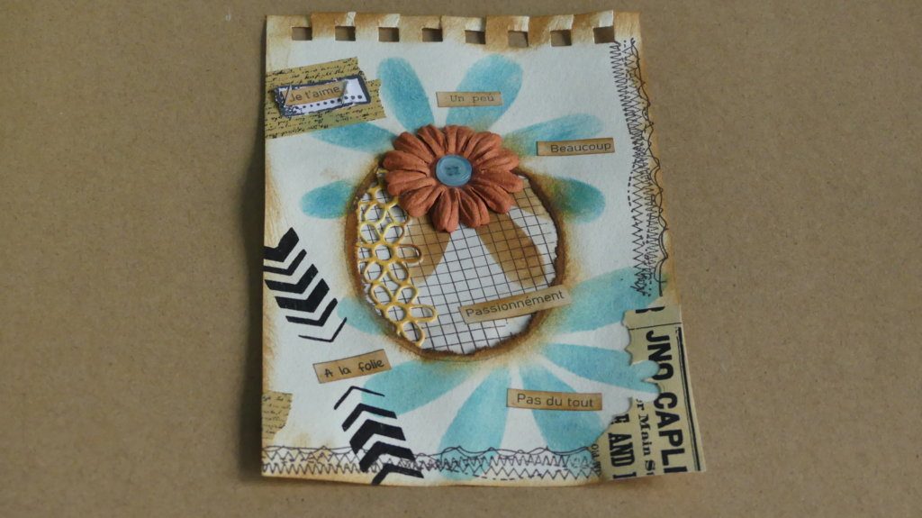 Page de junk journal décorée par une débutante avec tampons et papiers colorés