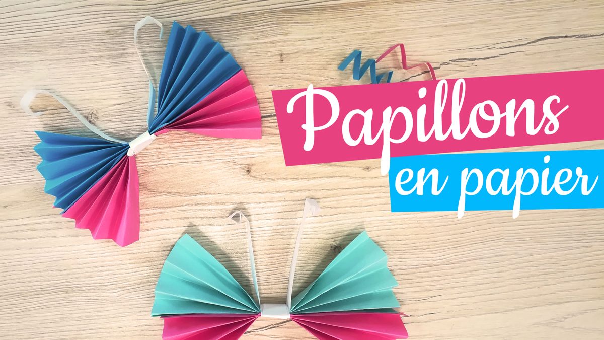 Papillons en papier colorés accrochés en guirlande