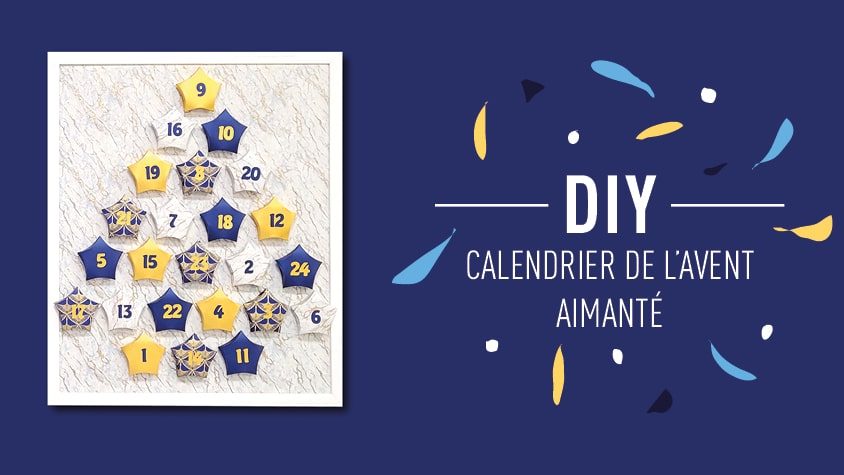 Calendrier de l’avent en papier présenté sur un support mural décoratif