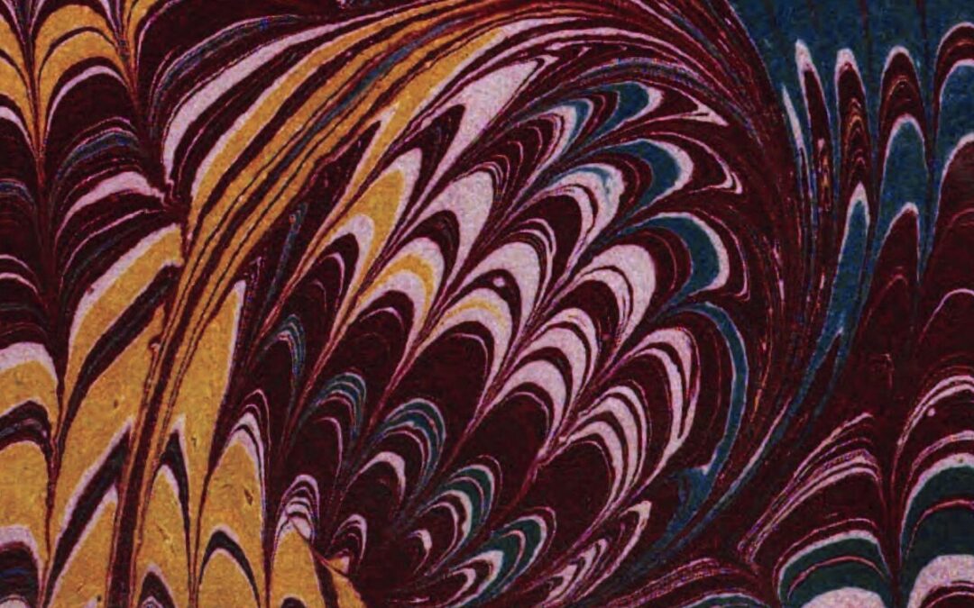 Papier marbré ancien aux motifs colorés en volutes