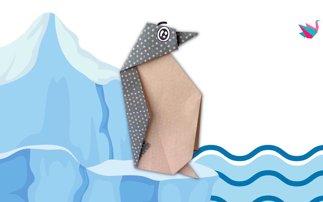 Pingouin en origami qui tient debout, papier à pois gris, posé sur une banquise